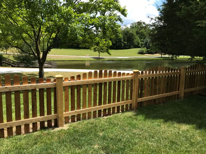 wooden fence in zionsville indiana backyard. wood fences are a popular choice when it comes to fencing
