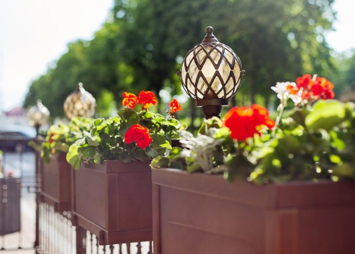 Solar Powered Fence Post Caps on Metal Fence at Residential Home in Indianapolis