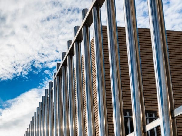 Metal fence around home
